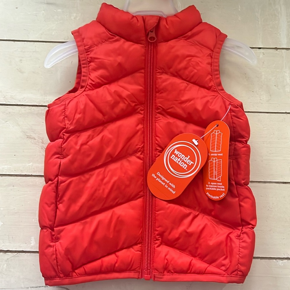 NWT orange packable vest